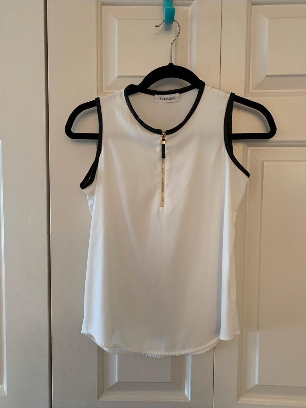 Calvin Klein White Sleeveless Shell with Black Trim and Gold Zip